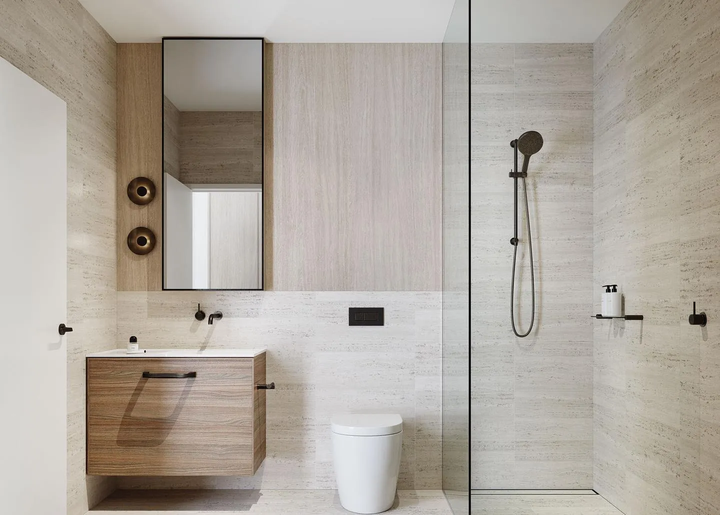 Stone-tiled bathroom render with timber vanity, black tapware, and frameless shower, Mode De Vie Brighton.